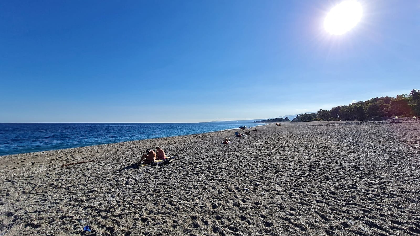 San Marco beach at Calatabiano, at the mouth of the Alcantara River, with view towards Taormina